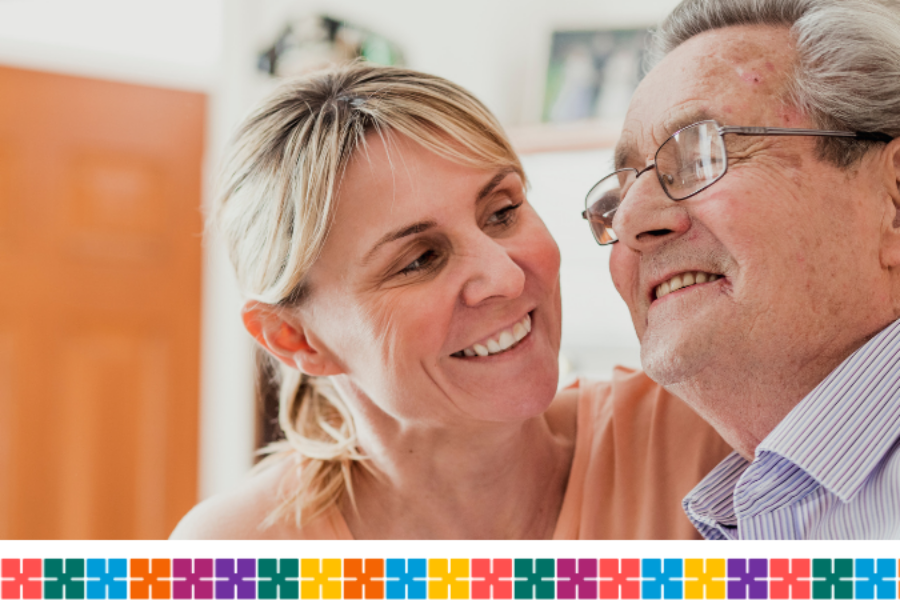 woman smiling at older man