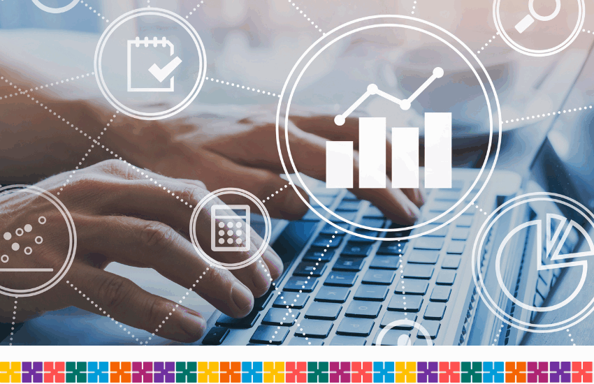 Workforce data concept showing over the top of somebody typing on a laptop keyboard