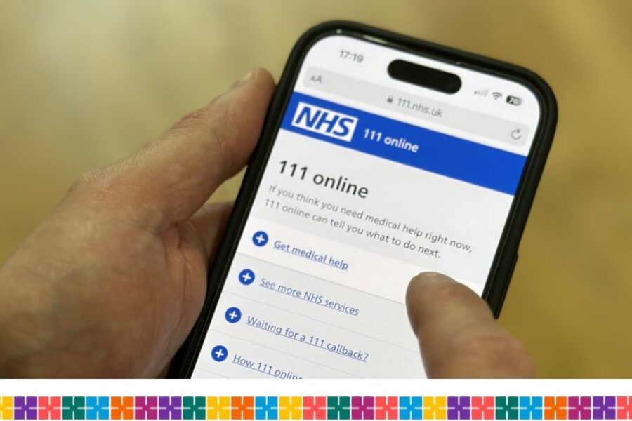 Man using NHS 111 online on his phone